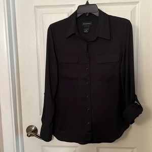 Black, 100% polyester shirt. Size small.